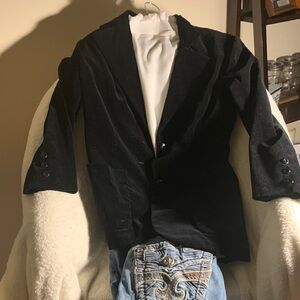 Classic Black Women's Blazers and Rock Revival jeans.